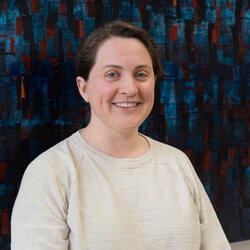 A woman with short brown hair.